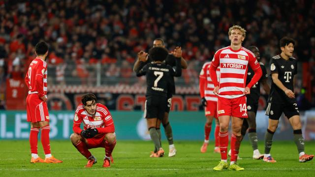 Union Berlin's Portuguese defender #04 Diogo Leite (2L) and Union Berlin's Austrian defender #14 Leopold Querfeld (2R) react after the German Cup (DFB-Pokal) round of 16 football match between 1 FC Union Berlin and FC Bayern Munich in Berlin on December 3, 2025. Harry Kane scored a first-half header as Bayern Munich did just enough to reach the German Cup quarter-finals in a 3-2 win at Union Berlin on Wednesday. (Photo by Odd ANDERSEN / AFP) / DFB REGULATIONS PROHIBIT ANY USE OF PHOTOGRAPHS AS IMAGE SEQUENCES AND QUASI-VIDEO.