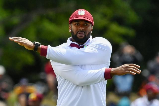 West Indies' Ojay Shields stretches during day three of the first Test cricket match between New Zealand and West Indies at Hagley Oval in Christchurch on December 4, 2025. (Photo by Sanka Vidanagama / AFP)