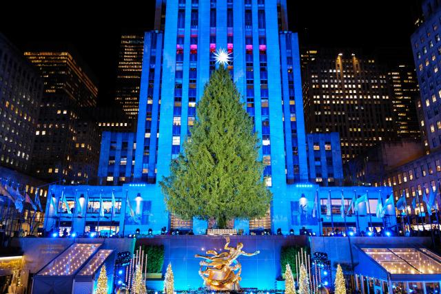 The Christmas tree is pictured before being lit up during the Rockefeller Center Christmas Tree Lighting in New York City on December 3, 2025. (Photo by CHARLY TRIBALLEAU / AFP)