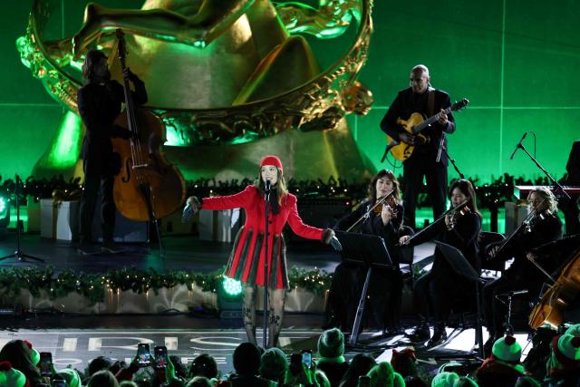 Icelandic singer Laufey performs during the Rockefeller Center Christmas Tree Lighting in New York on December 3, 2025. (Photo by CHARLY TRIBALLEAU / AFP)
