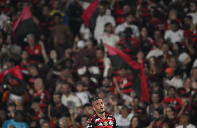 Flamengo's defender #16 Samuel Lino celebrates scoring his team's first goal during the Brasileirao Serie A football match between Flamengo and Ceara at Maracana Stadium in Rio de Janeiro, Brazil, on December 3, 2025. (Photo by Mauro PIMENTEL / AFP)