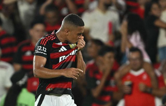 Flamengo's defender #16 Samuel Lino celebrates scoring his team's first goal during the Brasileirao Serie A football match between Flamengo and Ceara at Maracana Stadium in Rio de Janeiro, Brazil, on December 3, 2025. (Photo by Mauro PIMENTEL / AFP)