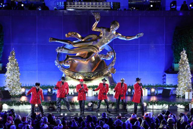 US R&B group New Edition performs during the Rockefeller Center Christmas Tree Lighting in New York on December 3, 2025. (Photo by CHARLY TRIBALLEAU / AFP)
