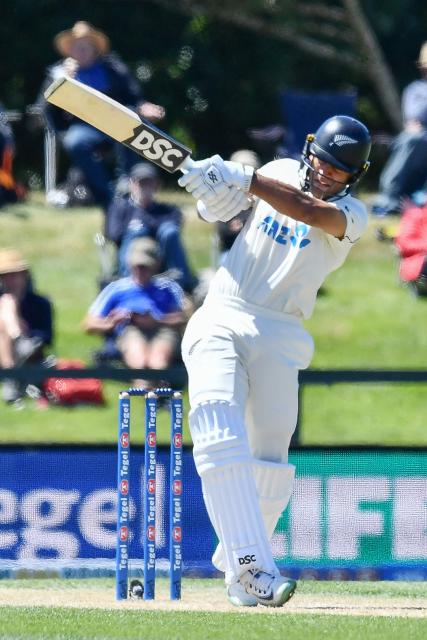 New Zealand's Rachin Ravindra bats during day three of the first Test cricket match between New Zealand and West Indies at Hagley Oval in Christchurch on December 4, 2025. (Photo by Sanka Vidanagama / AFP)