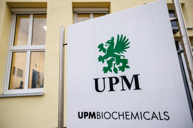 The logo of the chemical plants of the UPM Biorefining & Technology the Leuna Chemical Park near Leuna is pictured on November 14, 2025. Finnish materials group UPM unveiled a refinery in the east German state of Saxony-Anhalt in the summer, taking a big risk on a 1.3 billion euro project ($1.5 billion) at a difficult time for the German chemicals sector. (Photo by JENS SCHLUETER / AFP) / TO GO WITH AFP STORY