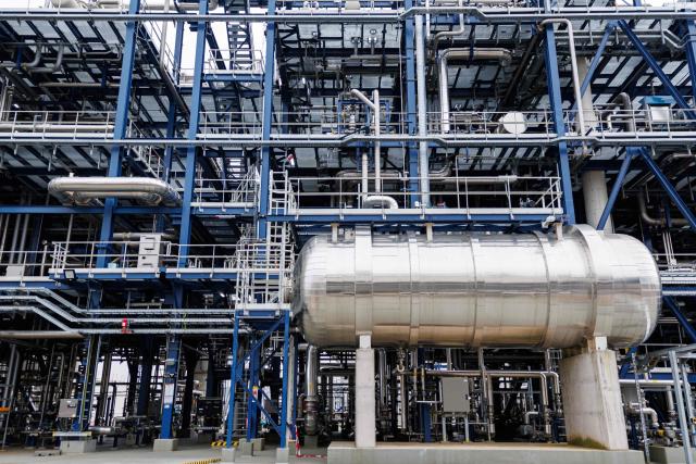 A part of the chemical plants of the UPM Biorefining & Technology the Leuna Chemical Park near Leuna is pictured on November 14, 2025. Finnish materials group UPM unveiled a refinery in the east German state of Saxony-Anhalt in the summer, taking a big risk on a 1.3 billion euro project ($1.5 billion) at a difficult time for the German chemicals sector. (Photo by JENS SCHLUETER / AFP) / TO GO WITH AFP STORY