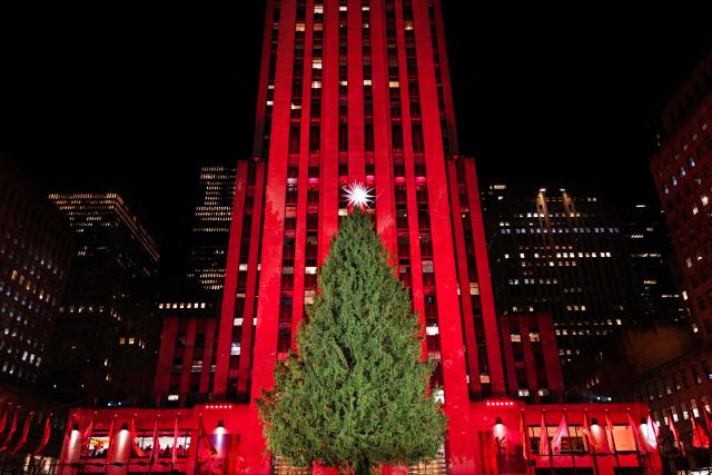 The Christmas tree is seen before being lit during the Rockefeller Center Christmas Tree Lighting in New York City on December 3, 2025. (Photo by CHARLY TRIBALLEAU / AFP)