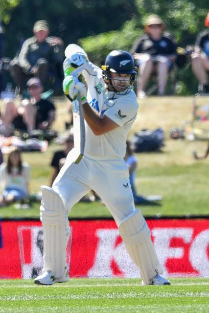 New Zealand's Tom Latham bats during day three of the first Test cricket match between New Zealand and West Indies at Hagley Oval in Christchurch on December 4, 2025. (Photo by Sanka Vidanagama / AFP)