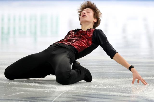 Belgium's Denis Krouglov competes in the Junior Men Short Program at the ISU Grand Prix of Figure Skating Final in Nagoya on December 4, 2025. (Photo by PAUL MILLER / AFP)