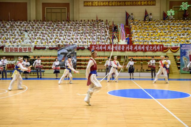 Participants take part in the 55th Sports Contest of Artistes at the Basketball Gymnasium on Chongchun Street in Pyongyang on December 4, 2025. (Photo by KIM Won Jin / AFP)