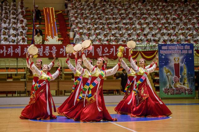 Participants take part in the 55th Sports Contest of Artistes at the Basketball Gymnasium on Chongchun Street in Pyongyang on December 4, 2025. (Photo by KIM Won Jin / AFP)