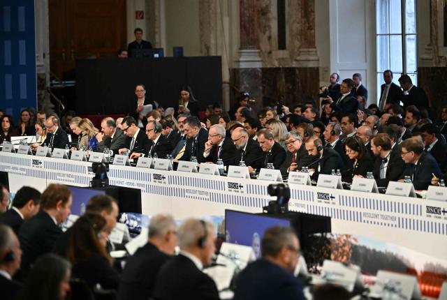 Participants attend a Ministerial Council meeting of the Oranization for Security and Co-operation in Europe (OSCE) on December 4, 2025 in Vienna, Austria. (Photo by Joe Klamar / AFP)