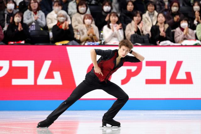 Belgium's Denis Krouglov competes in the Junior Men Short Program at the ISU Grand Prix of Figure Skating Final in Nagoya on December 4, 2025. (Photo by PAUL MILLER / AFP)