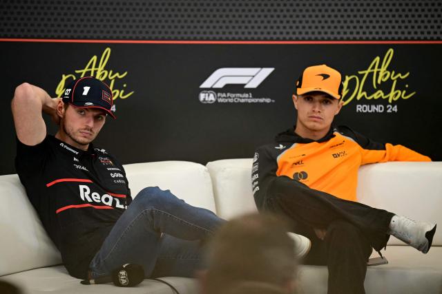 Red Bull Racing's Dutch driver Max Verstappen (L) and McLaren's British driver Lando Norris attend a press conference ahead of the Abu Dhabi Formula One Grand Prix at the Yas Marina Circuit in Abu Dhabi on December 4, 2025. (Photo by Giuseppe CACACE / AFP)