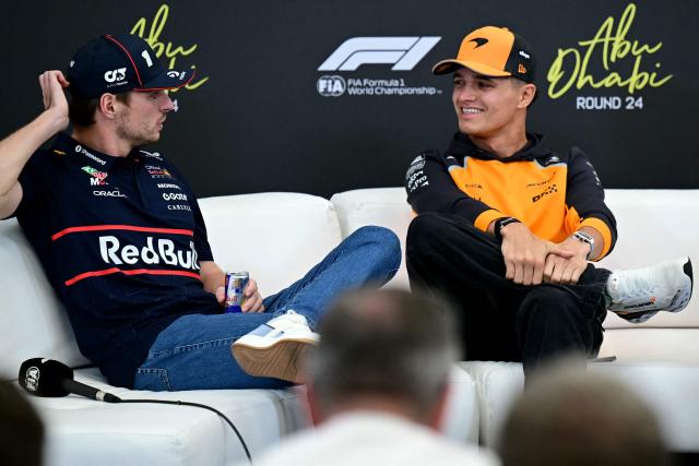 Red Bull Racing's Dutch driver Max Verstappen (L) and McLaren's British driver Lando Norris attend a press conference ahead of the Abu Dhabi Formula One Grand Prix at the Yas Marina Circuit in Abu Dhabi on December 4, 2025. (Photo by Giuseppe CACACE / AFP)
