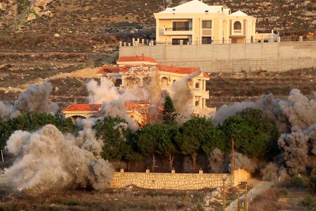 Smoke billows from the site of an Israeli airstrike that targeted the southern Lebanese village of al-Mjadel on December 4, 2025. The Israeli military said it would strike what it described as Hezbollah military infrastructure in southern Lebanon and warned people in two villages to evacuate immediately. (Photo by KAWANT HAJU / AFP)