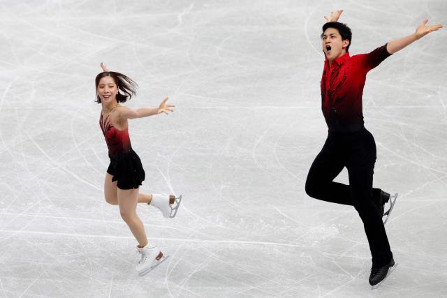 Japan's Riku Miura and Ryuichi Kihara compete in the Senior Pairs Short Program at the ISU Grand Prix of Figure Skating Final in Nagoya on December 4, 2025. (Photo by PAUL MILLER / AFP)