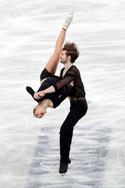Italy's Sara Conti and Niccolo Macii compete in the Senior Pairs Short Program at the ISU Grand Prix of Figure Skating Final in Nagoya on December 4, 2025. (Photo by PAUL MILLER / AFP)