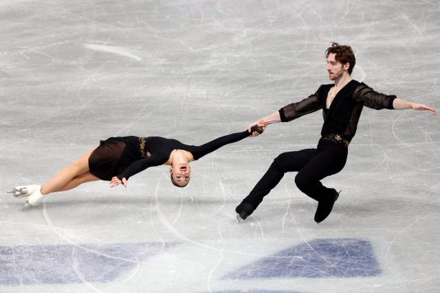 Italy's Sara Conti and Niccolo Macii compete in the Senior Pairs Short Program at the ISU Grand Prix of Figure Skating Final in Nagoya on December 4, 2025. (Photo by PAUL MILLER / AFP)