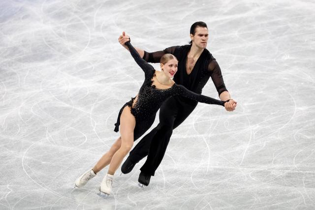Germany's Minerva Fabienne Hase and Nikita Volodin compete in the Senior Pairs Short Program at the ISU Grand Prix of Figure Skating Final in Nagoya on December 4, 2025. (Photo by PAUL MILLER / AFP)