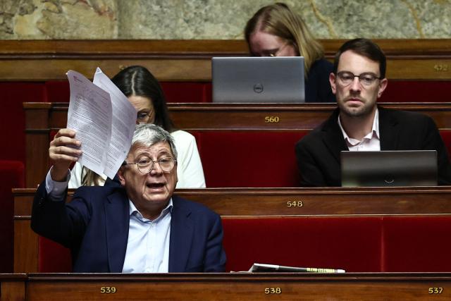 La France Insoumise - Nouveau Front Populaire's MP Eric Coquerel reacts during a session devoted to the second reading of the 2026 social security budget bill (PLFSS) at the National Assembly, the French Parliament lower house, in Paris on December 4, 2025. (Photo by Anne-Christine POUJOULAT / AFP)