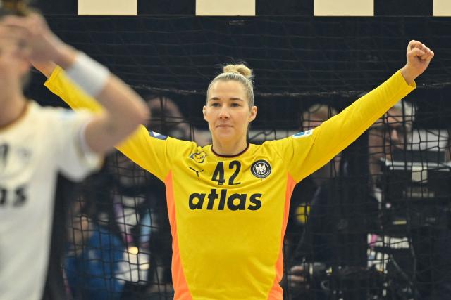 Germany's goalkeeper #42 Katharina Filter celebrates during the main round - Day 5 Group II handball match Montenegro v Germany of the IHF Women's Handball World Championship in Dortmund, western Germany on December 4, 2025. (Photo by INA FASSBENDER / AFP)