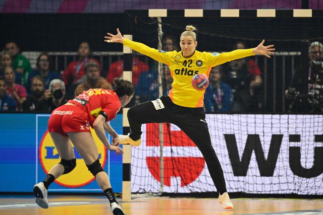 Montenegro's right back #15 Jelena Vukcevic shoots a penalty during the main round - Day 5 Group II handball match Montenegro v Germany of the IHF Women's Handball World Championship in Dortmund, western Germany on December 4, 2025. (Photo by INA FASSBENDER / AFP)