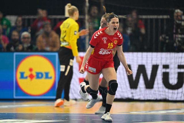Montenegro's right back #15 Jelena Vukcevic celebrates after scoring a penalty during the main round - Day 5 Group II handball match Montenegro v Germany of the IHF Women's Handball World Championship in Dortmund, western Germany on December 4, 2025. (Photo by INA FASSBENDER / AFP)