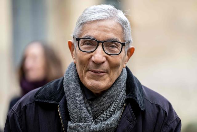 French-Algerian writer Boualem Sansal arrives to attend the ceremony of the Cino del Duca Award at the Academie Francaise (French Academy), in Paris on December 4, 2025. (Photo by BERTRAND GUAY / AFP)
