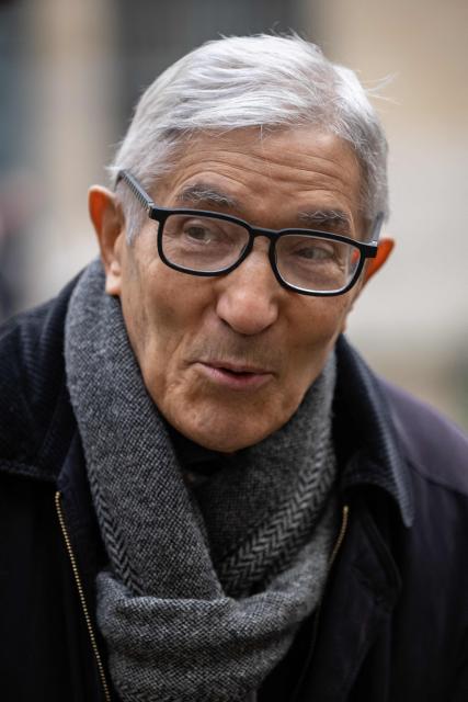 French-Algerian writer Boualem Sansal arrives to attend the ceremony of the Cino del Duca Award at the Academie Francaise (French Academy), in Paris on December 4, 2025. (Photo by BERTRAND GUAY / AFP)