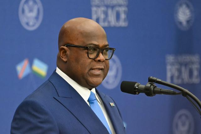 The Democratic Republic of the Congo's President Felix Tshisekedi speaks during signing ceremony hosted by President Donald Trump for a peace deal between Rwanda and the Democratic Republic of the Congo at the United States Institute of Peace in Washington, DC, on December 4, 2025. Trump on Thursday brings the leaders of Rwanda and the Democratic Republic of Congo together to endorse a deal that Trump has hailed as his latest peace triumph despite ongoing violence on the ground. Trump hopes the agreement will pave the way for the United States to gain access to critical minerals in the eastern DRC, a violence-torn region home to many of the key ingredients in modern technologies such as electric cars. (Photo by ANDREW CABALLERO-REYNOLDS / AFP)