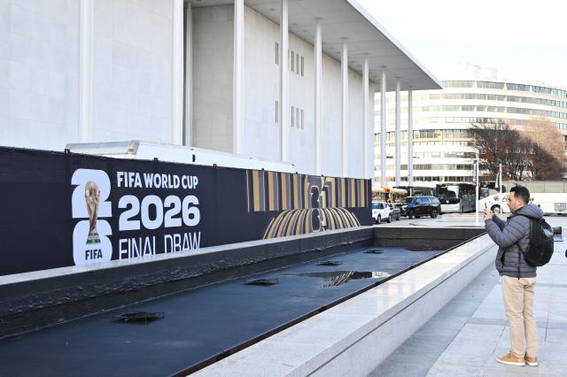 A December 4, 2025 photo shows the exterior of the Kennedy Center in Washington, DC on December 4, 2025. The Kennedy Center will be hosting the FIFA World Cup 2026 final draw on December 5. (Photo by MANDEL NGAN / AFP)