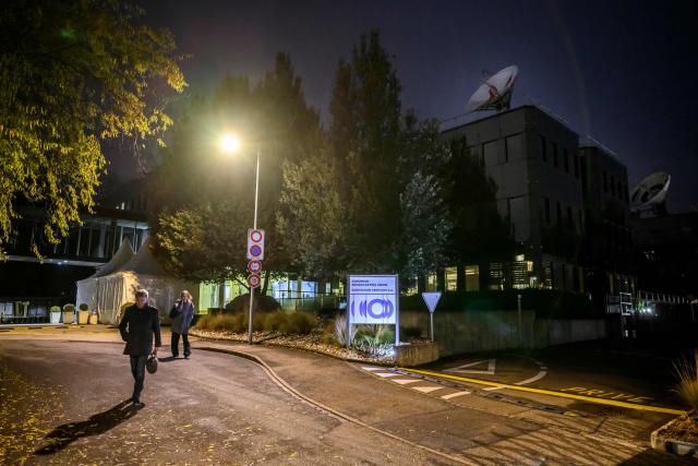 Delegates leave the headquarters of the European Broadcasting Union (EBU) after the first day of a two-day general assembly of the EBU, which organises the Eurovision Song Contest, in Geneva, on December 4, 2025. Israel will be allowed to take part in the 2026 Eurovision Song Contest, organisers decided, announcing a series of measures meant to address criticism over the country's participation. (Photo by Fabrice COFFRINI / AFP)