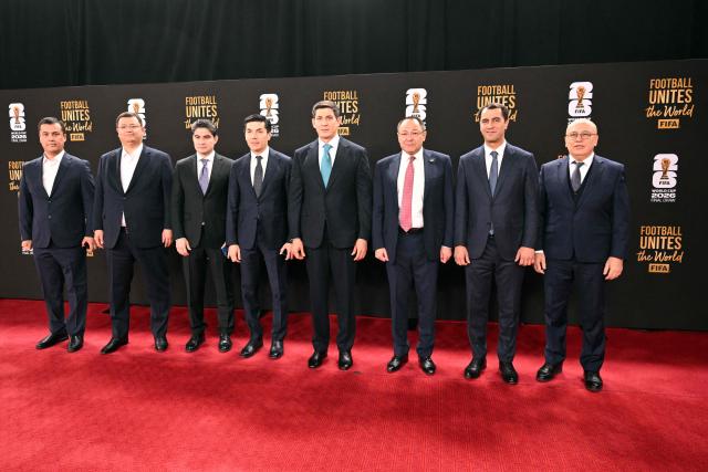 The Uzbekistan official delegation arrives for the pre-draw reception for the 2026 FIFA Football World Cup taking place in the US, Canada and Mexico, at the Kennedy Center, in Washington, DC, on December 4, 2025. (Photo by Roberto SCHMIDT / AFP)