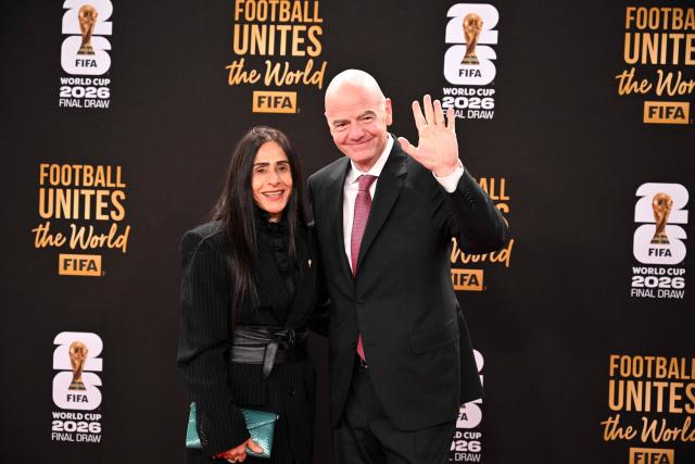 FIFA President Gianni Infantino and his wife Leena Al Ashqar arrive for the pre-draw reception for the 2026 FIFA Football World Cup taking place in the US, Canada and Mexico, at the Kennedy Center, in Washington, DC, on December 4, 2025. (Photo by Roberto SCHMIDT / AFP)