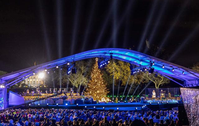 First Lady Melania Trump listens to US President Donald Trump speak at the National Christmas Tree Lighting at the Ellipse in Washington, DC, on December 4, 2025. (Photo by Alex WROBLEWSKI / AFP)