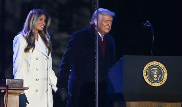 US President Donald Trump and First Lady Melania Trump attend the National Christmas Tree Lighting at the Ellipse in Washington, DC, on December 4, 2025. (Photo by Alex WROBLEWSKI / AFP)