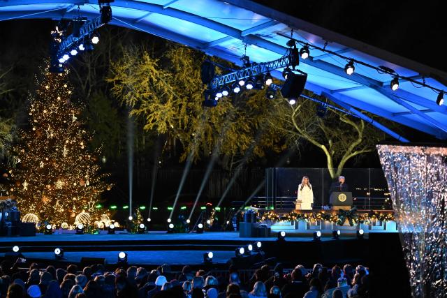 First Lady Melania Trump listens to US President Donald Trump speak at the National Christmas Tree Lighting at the Ellipse in Washington, DC, on December 4, 2025. (Photo by Alex WROBLEWSKI / AFP)