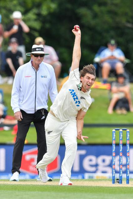 New Zealand's Zak Foulkes bowls during day four of the first Test cricket match between New Zealand and West Indies at Hagley Oval in Christchurch on December 5, 2025. (Photo by Sanka Vidanagama / AFP)