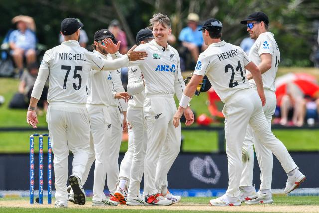 New Zealand's Michael Bracewell (C) celebrates with teammates after the dismissal of West Indies' Alick Athanaze during day four of the first Test cricket match between New Zealand and West Indies at Hagley Oval in Christchurch on December 5, 2025. (Photo by Sanka Vidanagama / AFP)