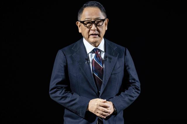Toyota Motor Corporation Board Chairman Akio Toyoda delivers a speech during the company’s all-new sports models World Premiere at the Toyota Woven City in Susono, Shizuoka prefecture on December 5, 2025. (Photo by Yuichi YAMAZAKI / AFP)