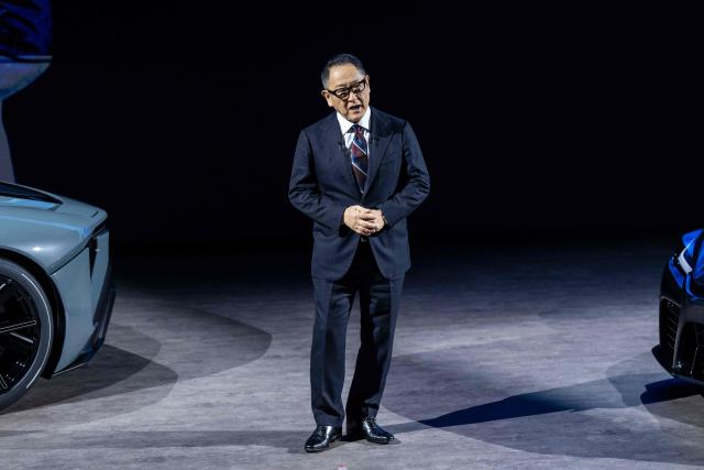 Toyota Motor Corporation Board Chairman Akio Toyoda delivers a speech during the company’s all-new sports models World Premiere at the Toyota Woven City in Susono, Shizuoka prefecture on December 5, 2025. (Photo by Yuichi YAMAZAKI / AFP)