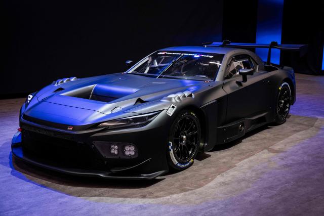 Japan's auto maker Toyota Motor displays the prototype model 'GR GT3' during the company’s all-new sports models World Premiere at the Toyota Woven City in Susono, Shizuoka prefecture on December 5, 2025. (Photo by Yuichi YAMAZAKI / AFP)