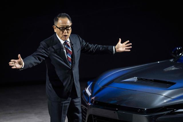 Toyota Motor Corporation Board Chairman Akio Toyoda delivers a speech during the company’s all-new sports models World Premiere at the Toyota Woven City in Susono, Shizuoka prefecture on December 5, 2025. (Photo by Yuichi YAMAZAKI / AFP)