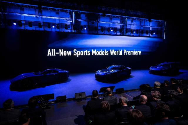 Toyota Motor Corporation unveils the company’s all-new sports models during the World Premiere at the Toyota Woven City in Susono, Shizuoka prefecture on December 5, 2025. (Photo by Yuichi YAMAZAKI / AFP)