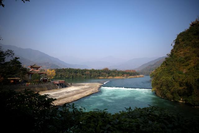 A general view shows the Dujiangyan site, a designated UNESCO World Heritage site, during a visit by French President Emmanuel Macron and Chinese President Xi Jinping in Dujiangyan, in southwestern China's Sichuan province on December 5, 2025. (Photo by Sarah Meyssonnier / POOL / AFP)