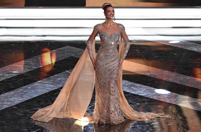 Clara Vegas walks in evening gown during Miss Venezuela beauty contest in Caracas on December 4, 2025. Venezuela chose its beauty queen on December 4, 2025, in a night filled with lights, music and many sequins that some in the audience saw as fresh air from the tension over the US military deployment in the Caribbean. (Photo by Juan BARRETO / AFP)