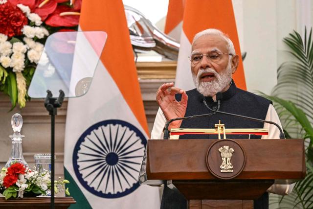 India's Prime Minister Narendra Modi speaks during joint press statements with Russia's President Vladimir Putin after their meeting at the Hyderabad House in New Delhi on December 5, 2025. (Photo by Sajjad HUSSAIN / AFP)