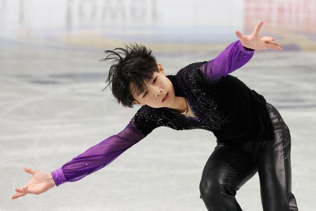 Japan's Taiga Nishino competes in the Junior Men Free Skating at the ISU Grand Prix of Figure Skating Final in Nagoya on December 5, 2025. (Photo by PAUL MILLER / AFP)