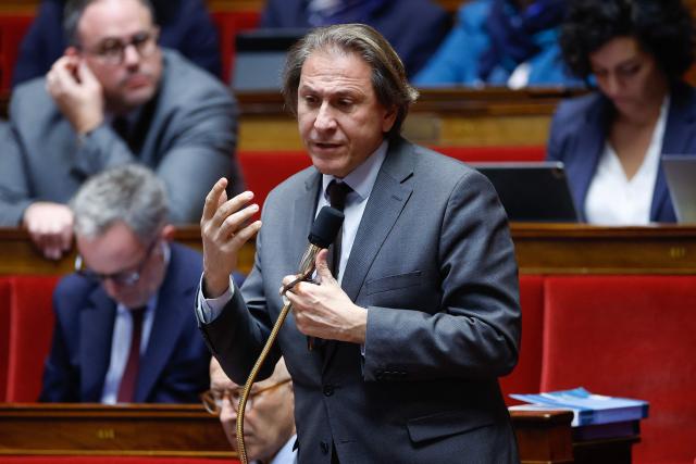 Socialistes et Apparentes' MP Aurelien Rousseau, Socialistes et Apparentes' MP Jerome Guedj speaks during the voting session of amendments focused on the 2026 social security budget bill (PLFSS) at the National Assembly, the French Parliament lower house, in Paris on December 5, 2025. (Photo by Ian LANGSDON / AFP)